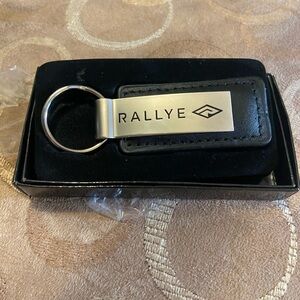 Authentic Rallye keychain- new in box- approx 3 inches after ring.